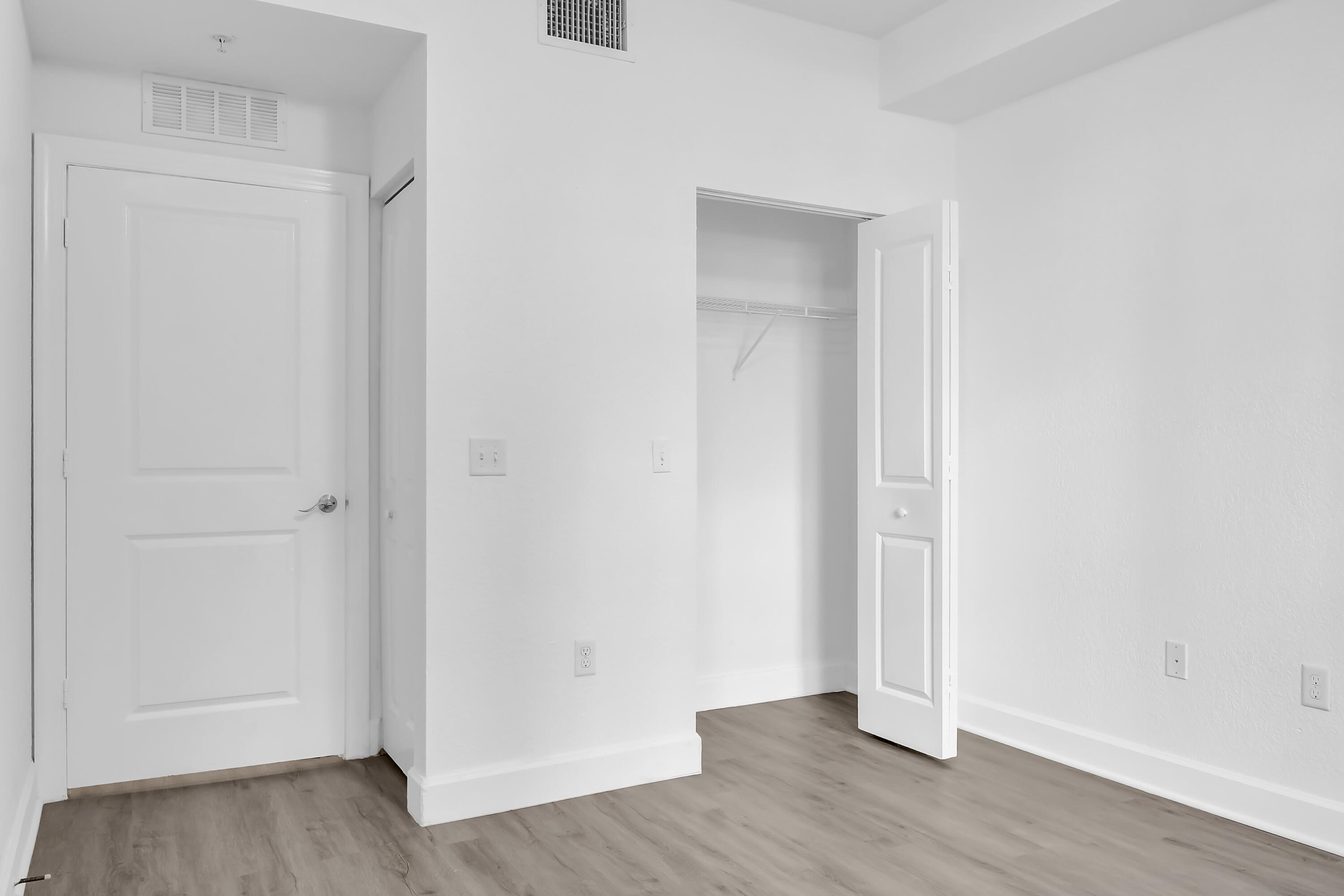 1660 Renaissance Commons Boulevard, Unit 2122 Boynton Beach, FL 33426 - Photo 26 of 38 a view of a small space with wooden floor