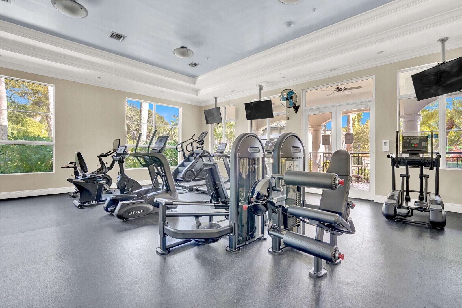 1660 Renaissance Commons Boulevard, Unit 2122 Boynton Beach, FL 33426 - Photo 10 of 38 a view of a room with gym equipment