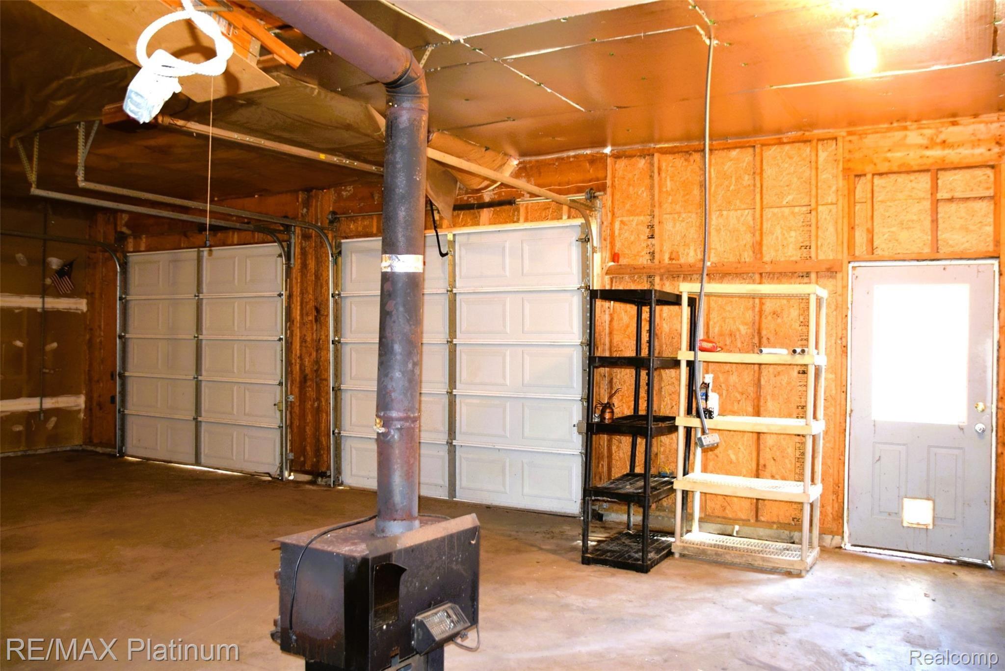 1513 East Marr Road Howell, MI 48855 - Photo 29 of 38 garage with tall doors.JPG