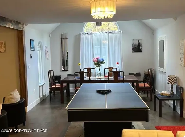 a view of a dining room with furniture