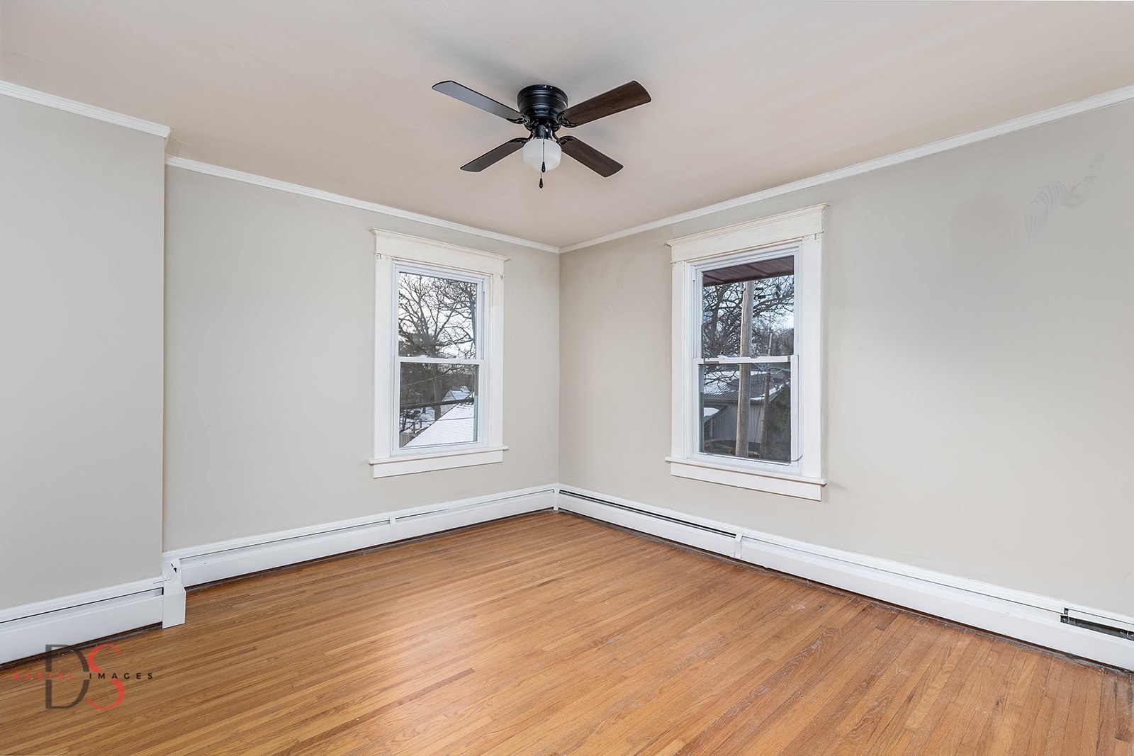108 West Wilson Street Streator, IL 61364 - Photo 10 of 29 wooden floor in an empty room with a window