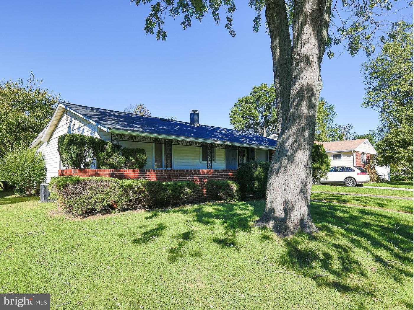 3114 Fairview Road Baltimore, MD 21207 - Photo 2 of 30 a view of a house with a yard and tree s