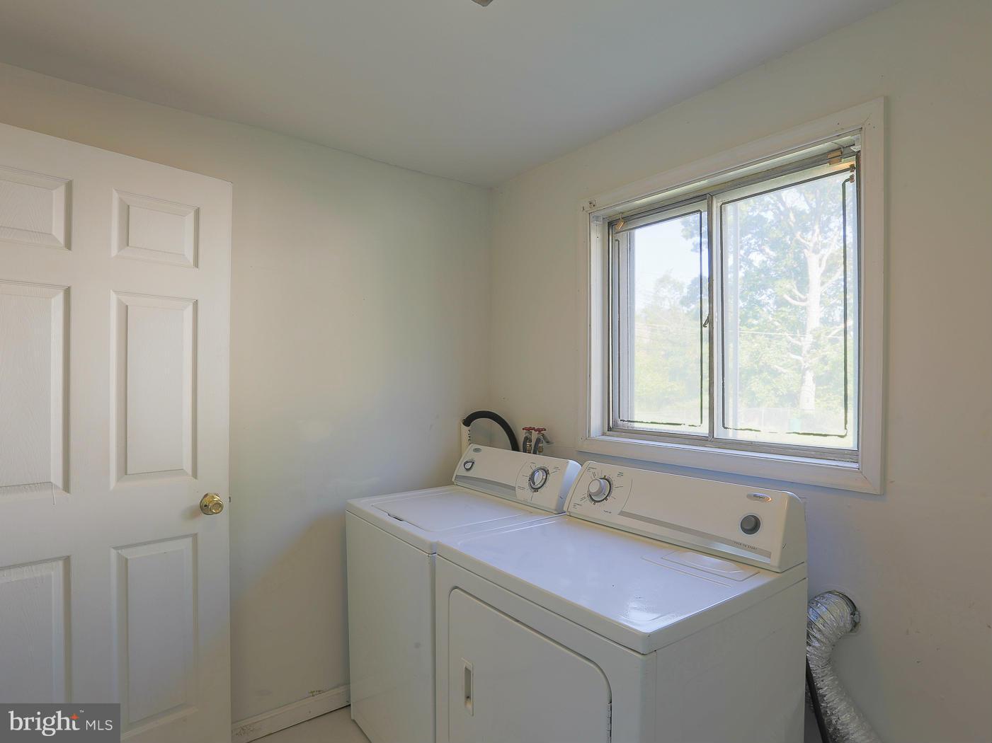 3114 Fairview Road Baltimore, MD 21207 - Photo 16 of 30 a bathroom with a sink and a window