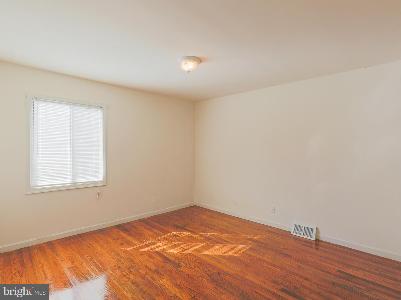 3114 Fairview Road Baltimore, MD 21207 - Photo 18 of 30 an empty room with a window