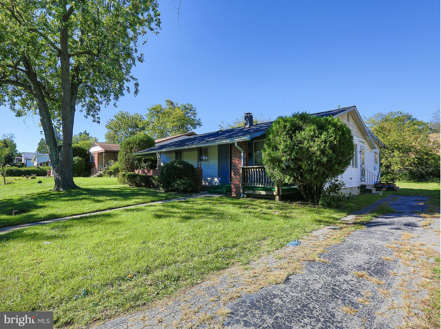 3114 Fairview Road Baltimore, MD 21207 - Photo 29 of 30 a front view of a house with a yard