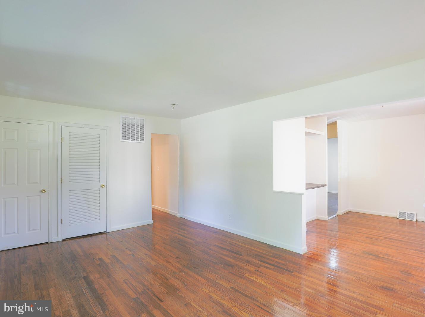 3114 Fairview Road Baltimore, MD 21207 - Photo 10 of 30 a view of empty room with wooden floor