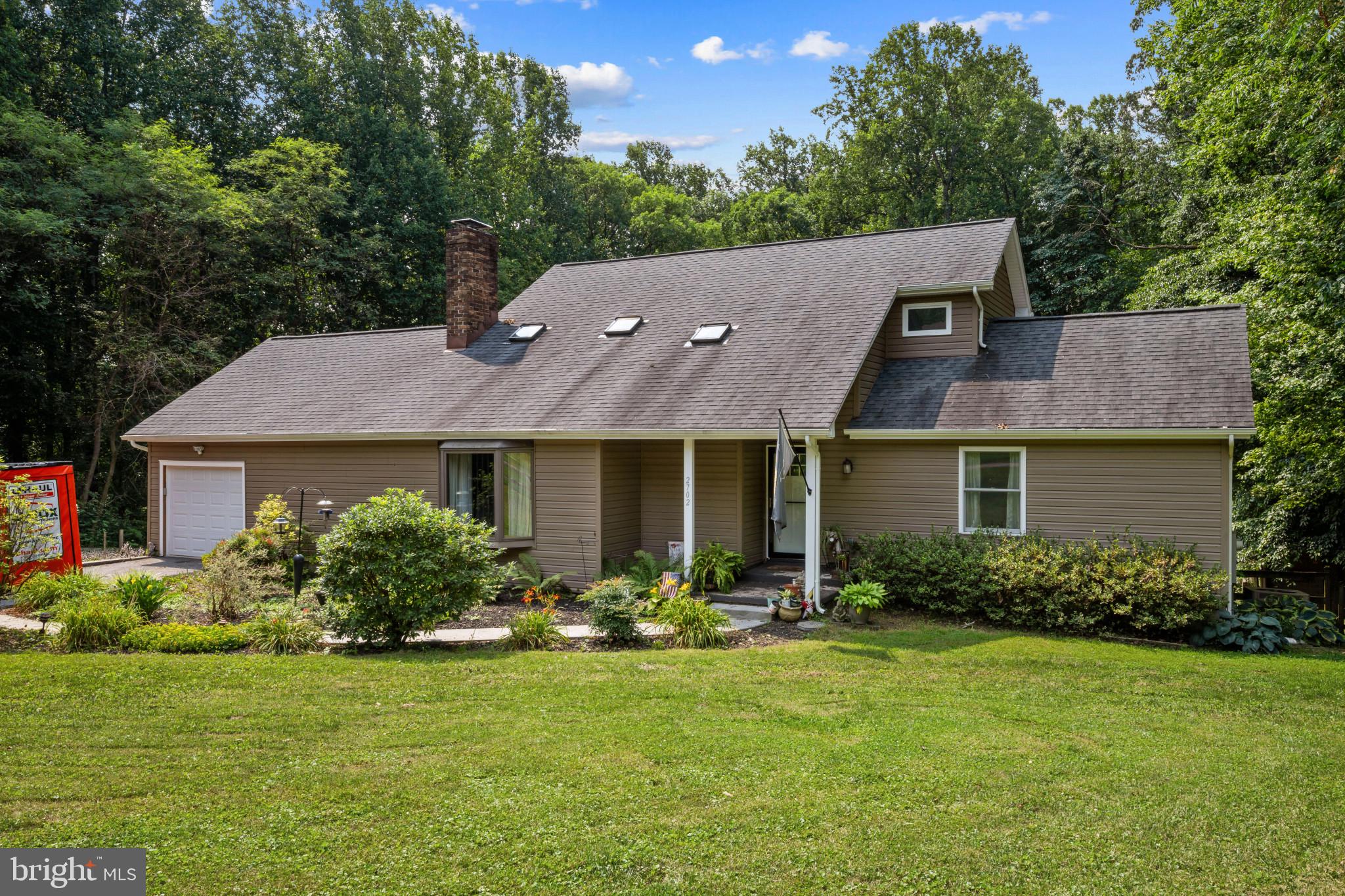2702 Bird View Road Westminster, MD 21157 - Photo 3 of 41 front view of house with a yard