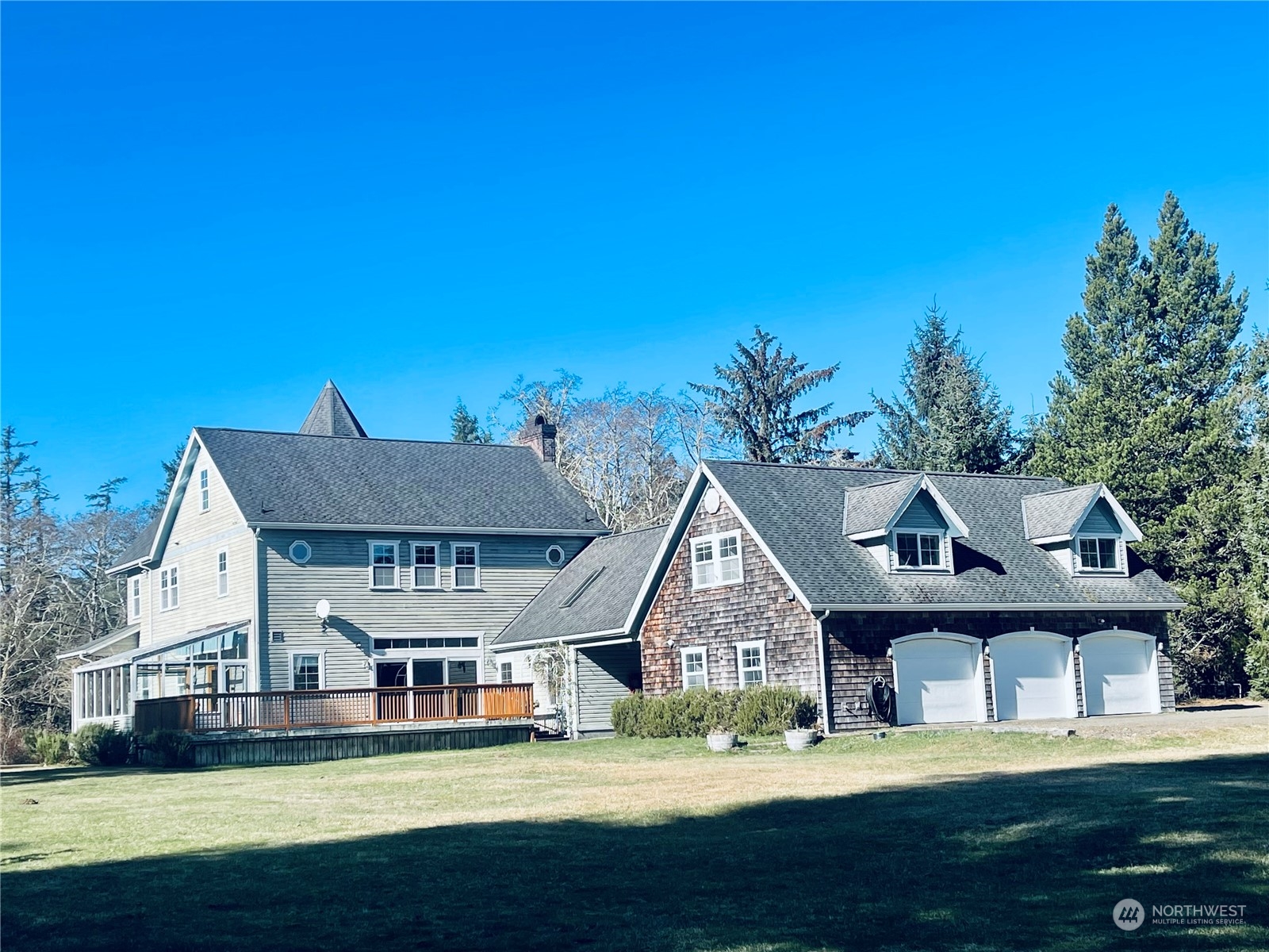 36808 Stackpole Road Oysterville, WA 98641 - Photo 2 of 40 a front view of a house with garden