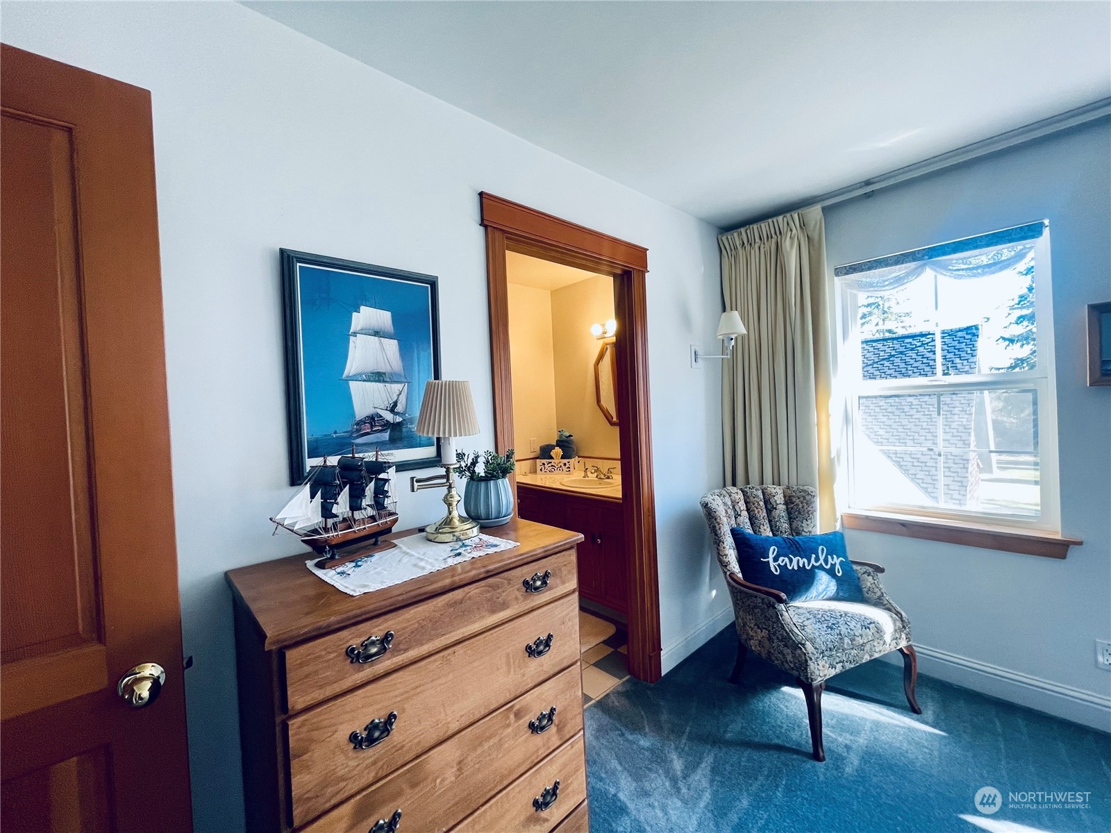 36808 Stackpole Road Oysterville, WA 98641 - Photo 25 of 40 a room with furniture and two windows