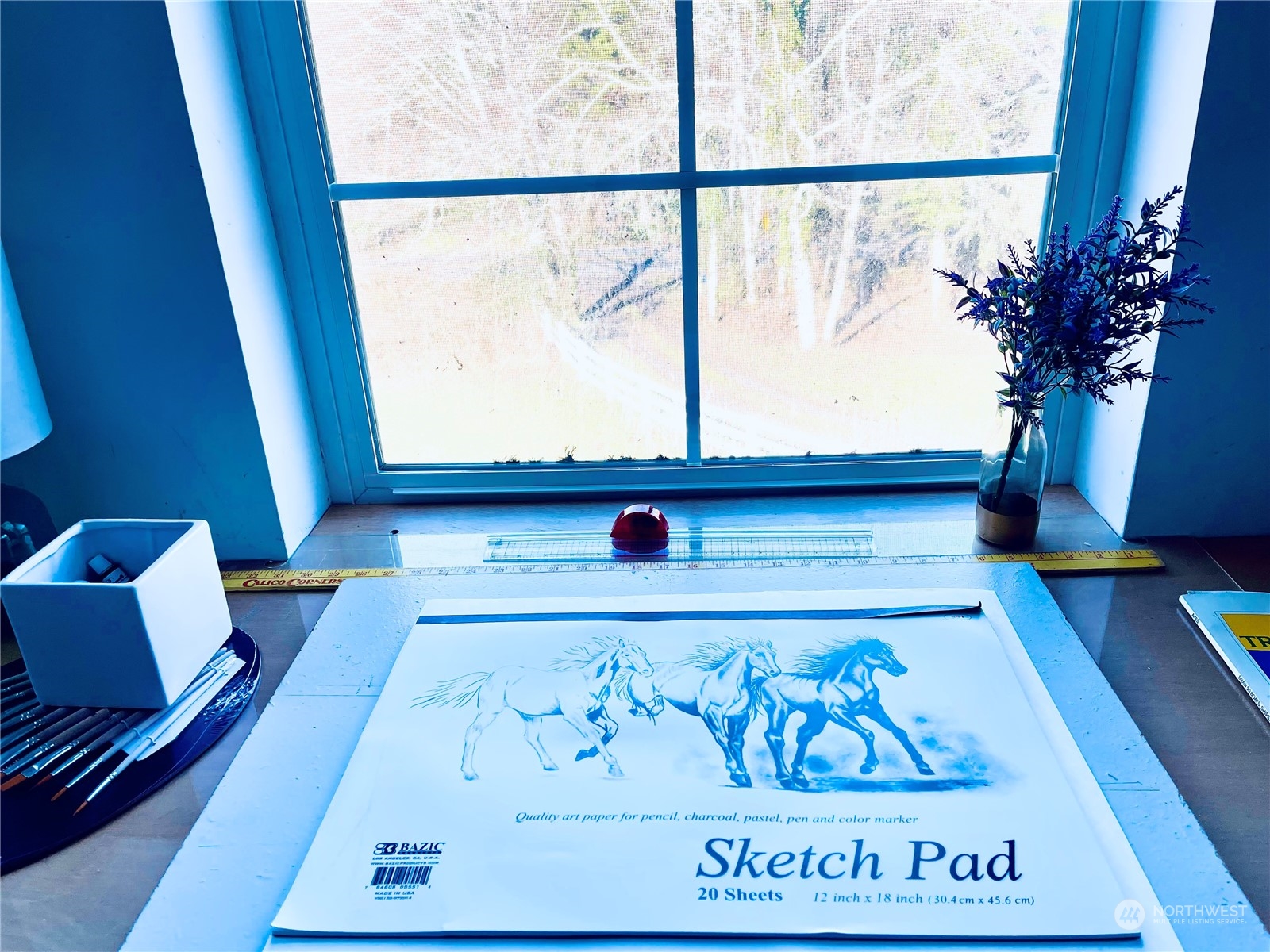 36808 Stackpole Road Oysterville, WA 98641 - Photo 27 of 40 a picture of a book and a rug