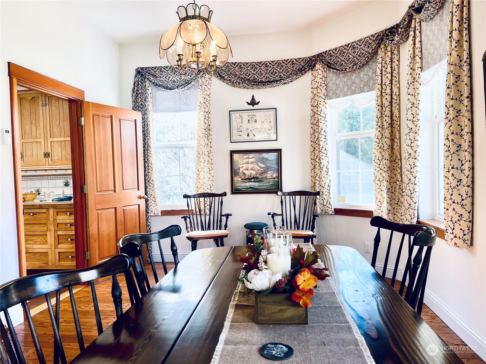 36808 Stackpole Road Oysterville, WA 98641 - Photo 10 of 40 a living room with furniture and a large window