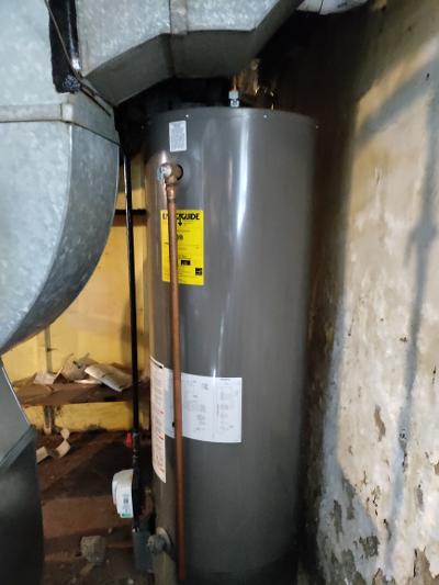 227 Ave C Rochelle, IL 61068 - Photo 30 of 36 a picture of water heater