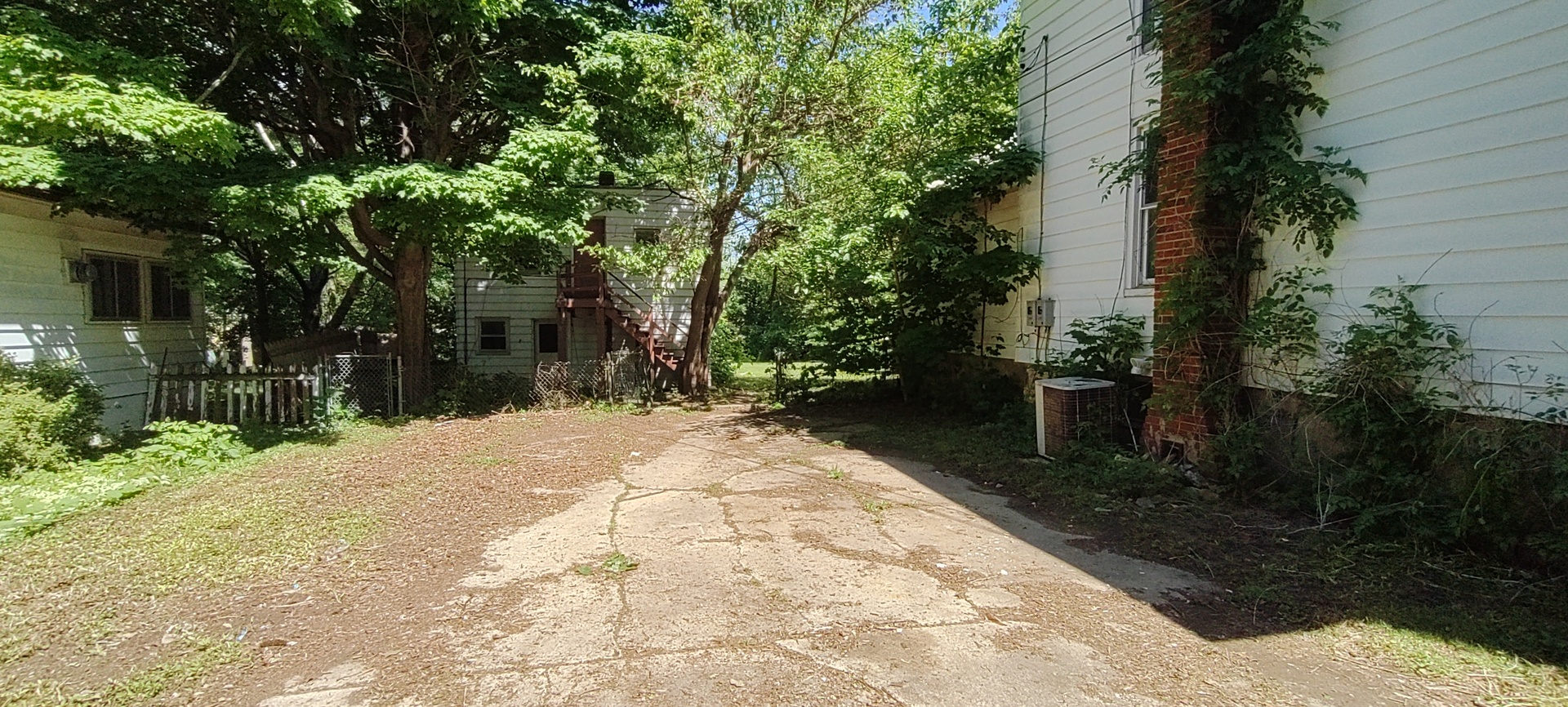 227 Ave C Rochelle, IL 61068 - Photo 10 of 36 a pathway of a house with a yard