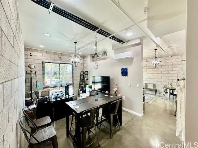 a view of a living room and dining room