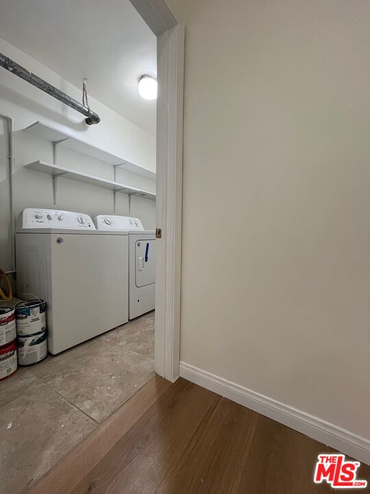 1530 5th Avenue Los Angeles, CA 90019 - Photo 8 of 9 a utility room with dryer and washer