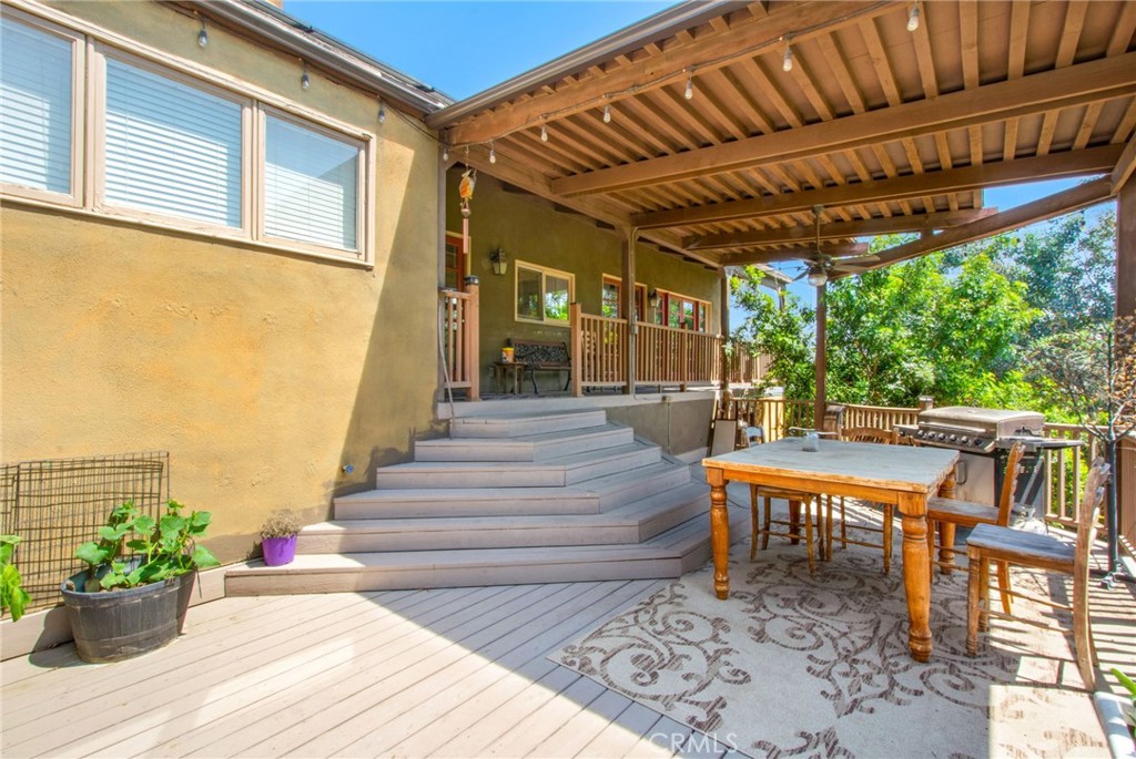 7241 Old Temescal Road Corona, CA 92881 - Photo 23 of 47 a balcony with furniture and a potted plant