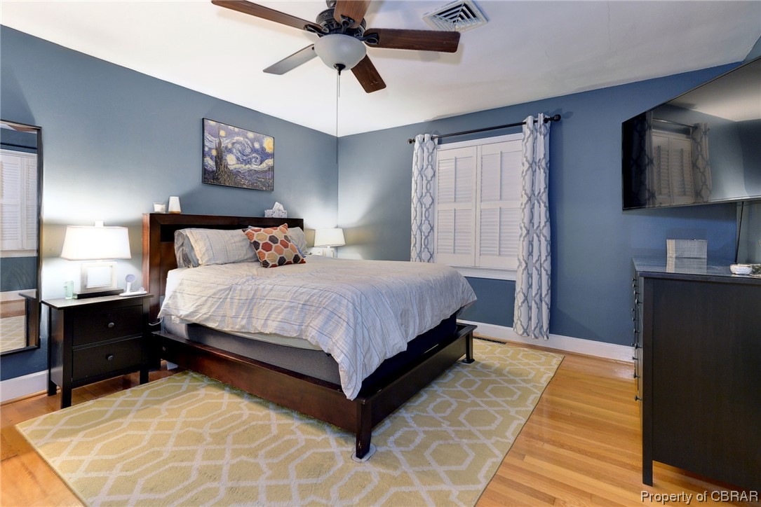 122 Selden Road Newport News, VA 23606 - Photo 17 of 38 Hardwood floored Primary bedroom featuring ceiling fan