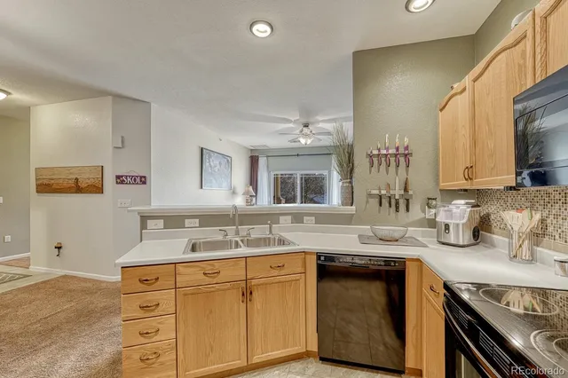 a bathroom with a granite countertop sink a mirror and a