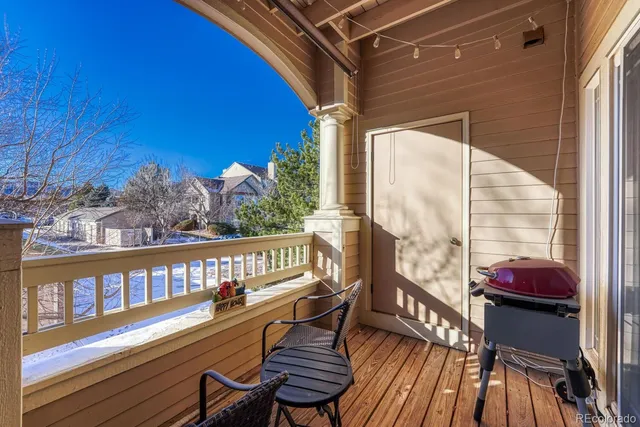 a view of balcony with a potted plant