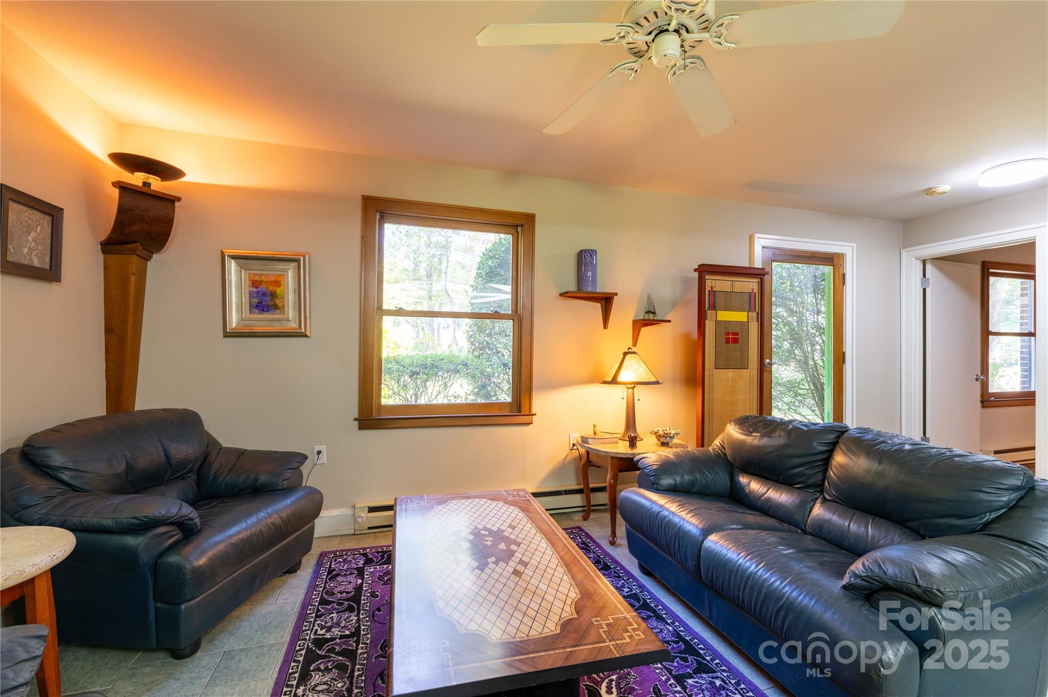 7825 Buck Creek Road Marion, NC 28752 - Photo 11 of 48 a living room with furniture and a window