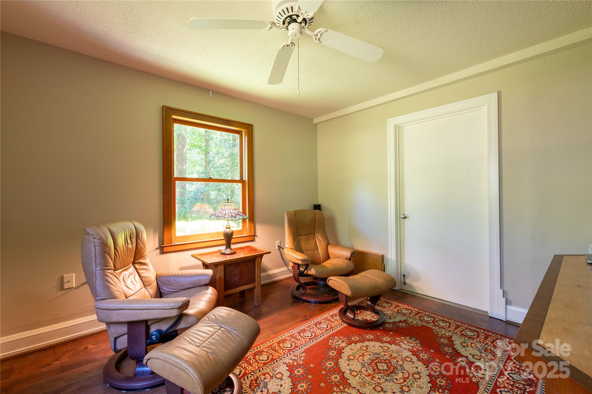 7825 Buck Creek Road Marion, NC 28752 - Photo 14 of 48 a living room with furniture and a window