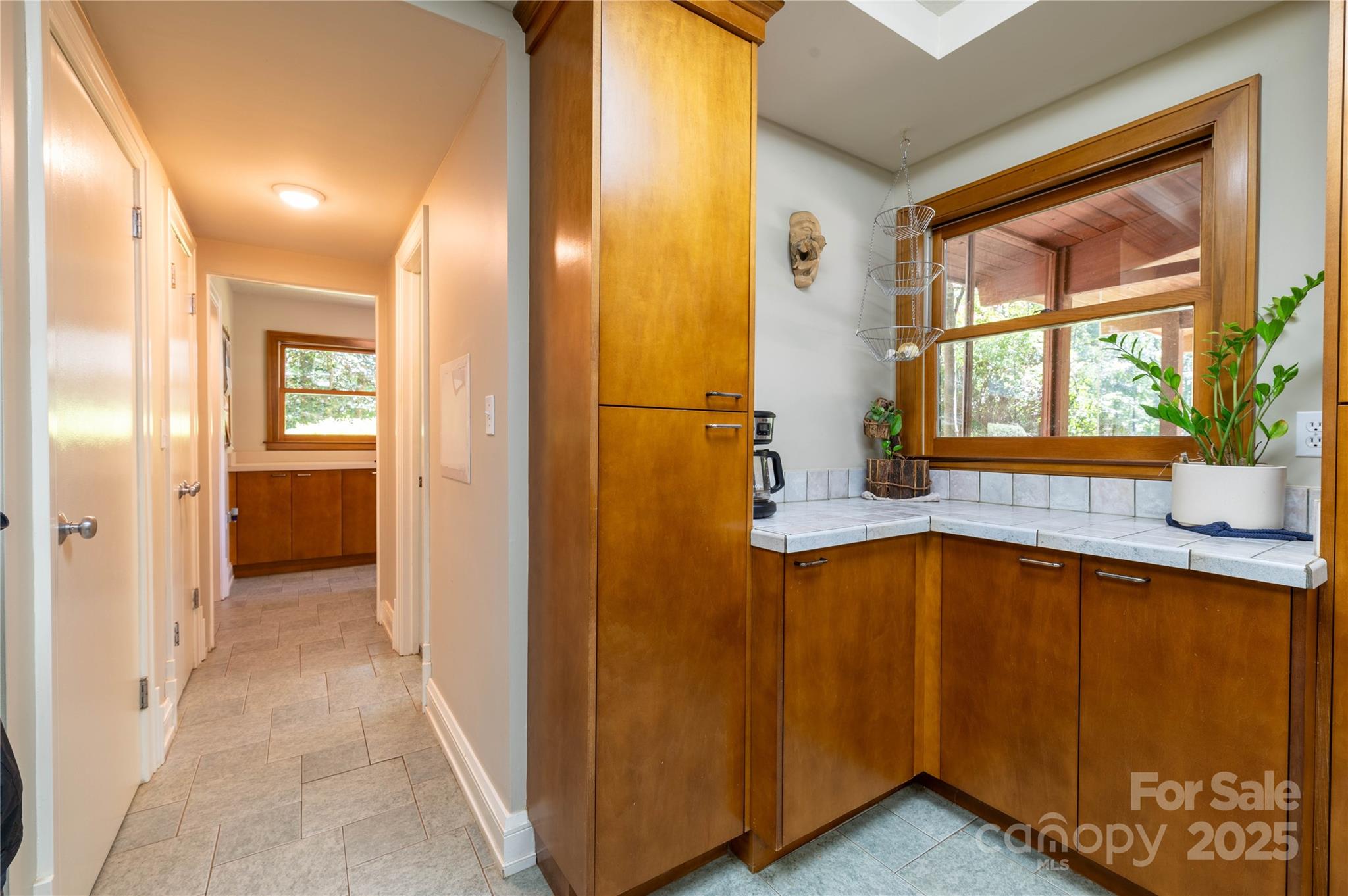 7825 Buck Creek Road Marion, NC 28752 - Photo 18 of 48 a view of a bathroom with a tub and windows