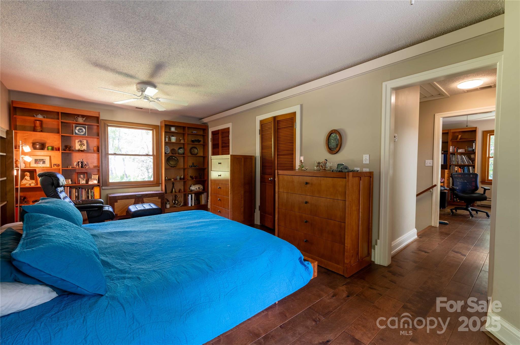 7825 Buck Creek Road Marion, NC 28752 - Photo 23 of 48 a bed room with a bed and a large window