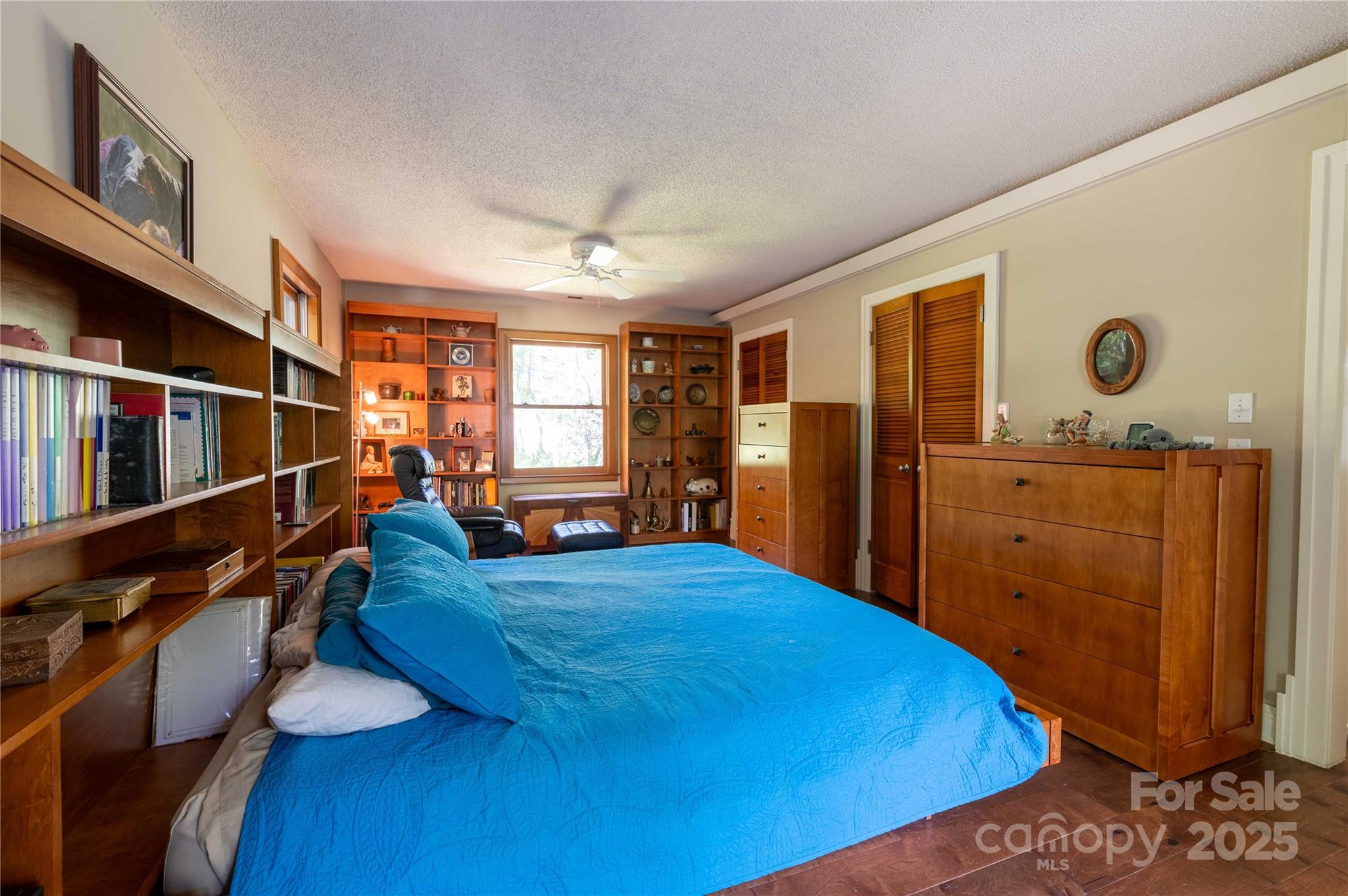 7825 Buck Creek Road Marion, NC 28752 - Photo 24 of 48 a bed room with a bed and a window