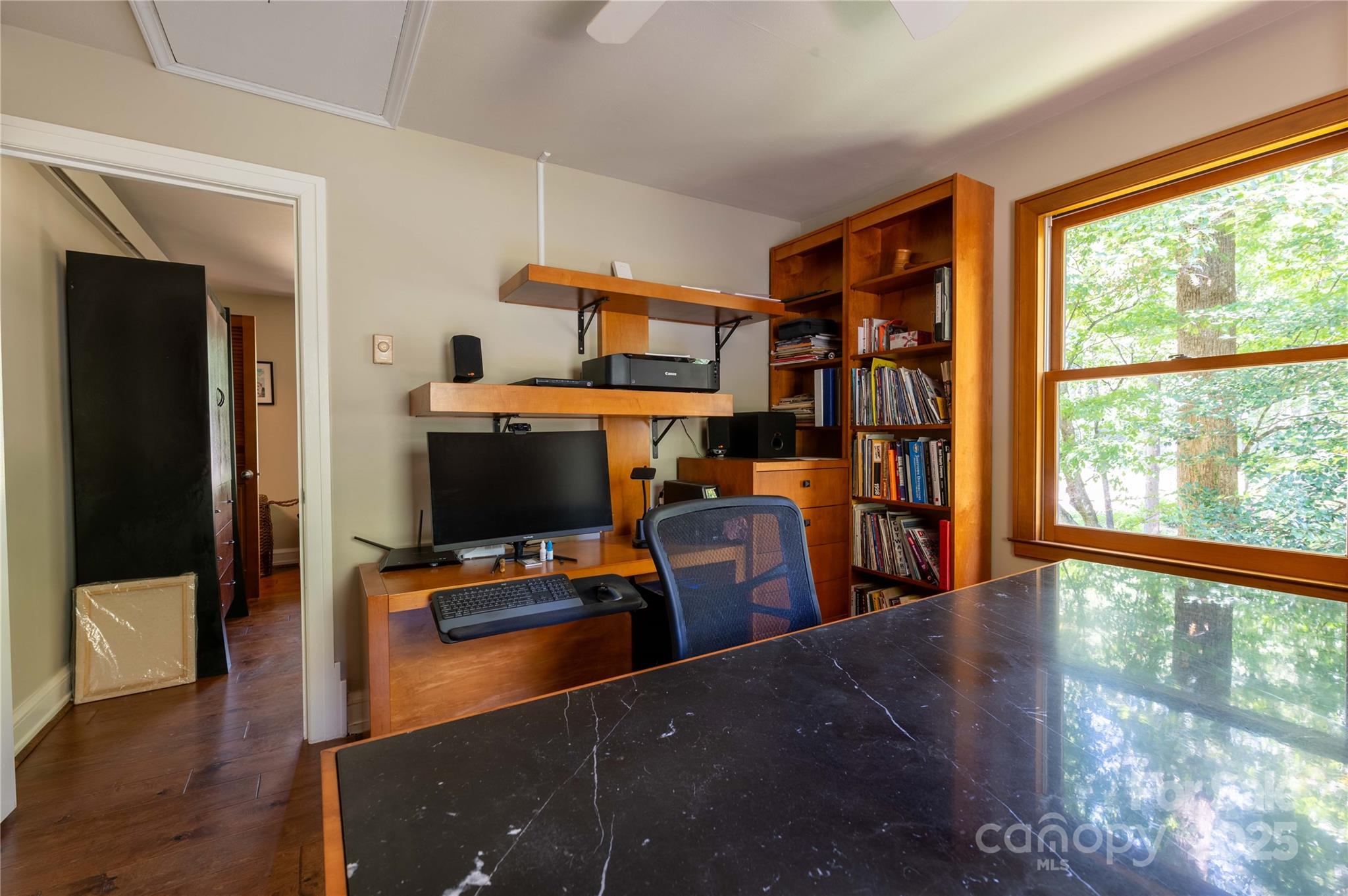 7825 Buck Creek Road Marion, NC 28752 - Photo 32 of 48 a room with furniture and a window