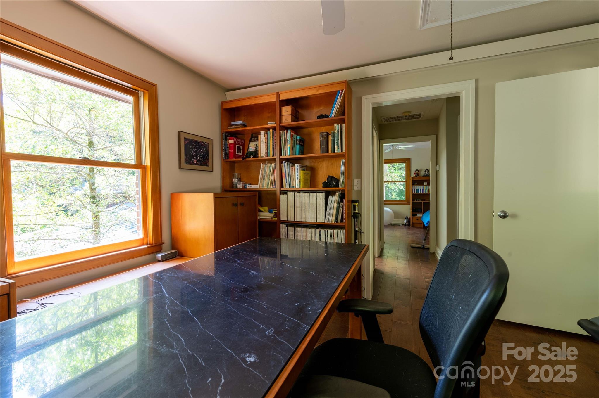 7825 Buck Creek Road Marion, NC 28752 - Photo 33 of 48 a view of a workspace with furniture and a window