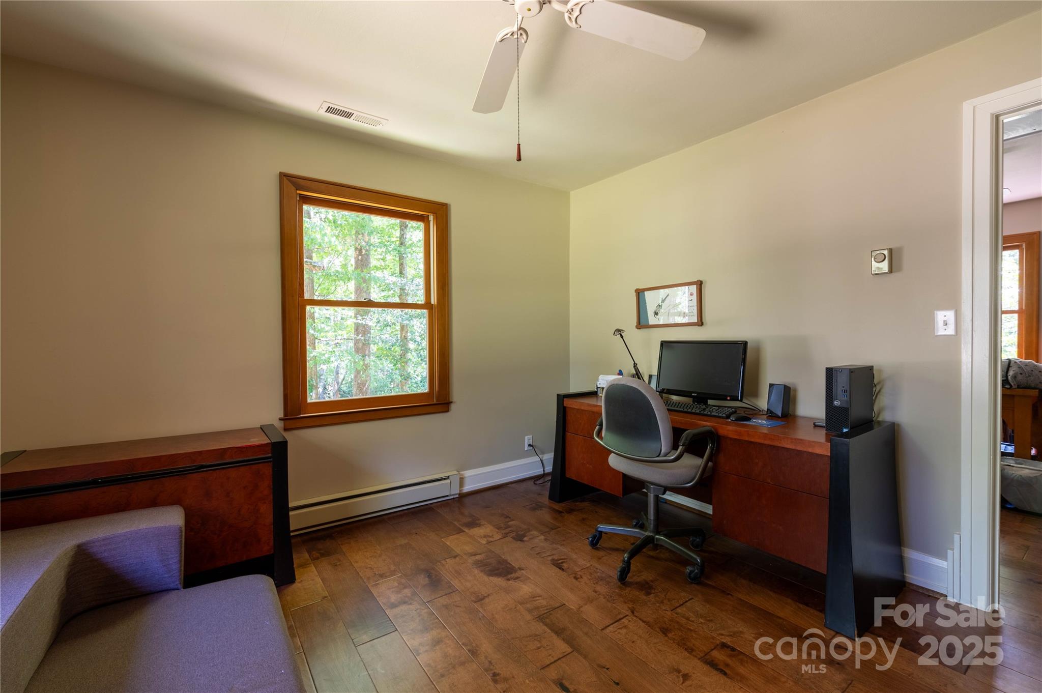 7825 Buck Creek Road Marion, NC 28752 - Photo 35 of 48 a view of a workspace with furniture and a window