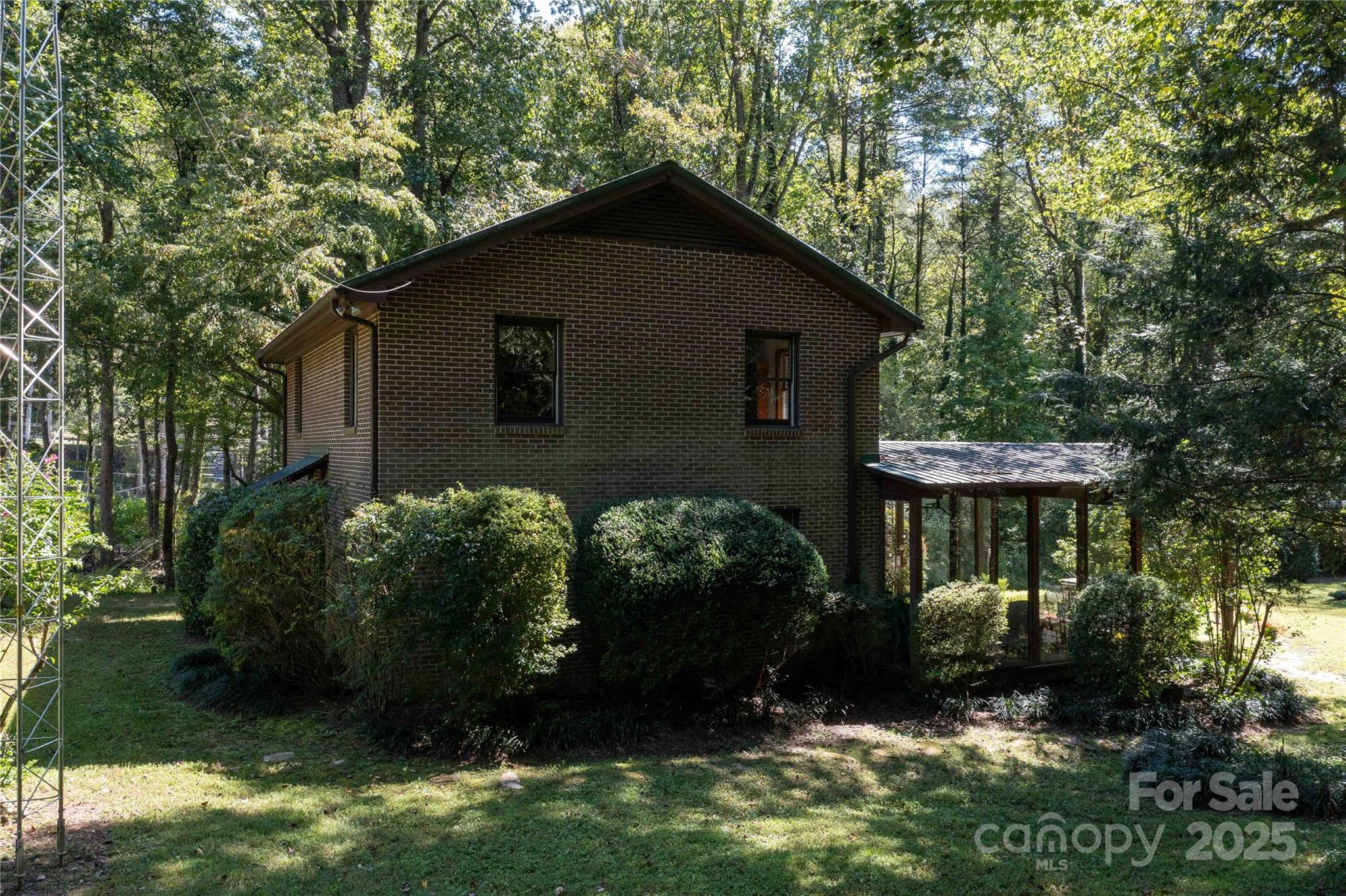 7825 Buck Creek Road Marion, NC 28752 - Photo 38 of 48 a backyard of a house with lots of green space