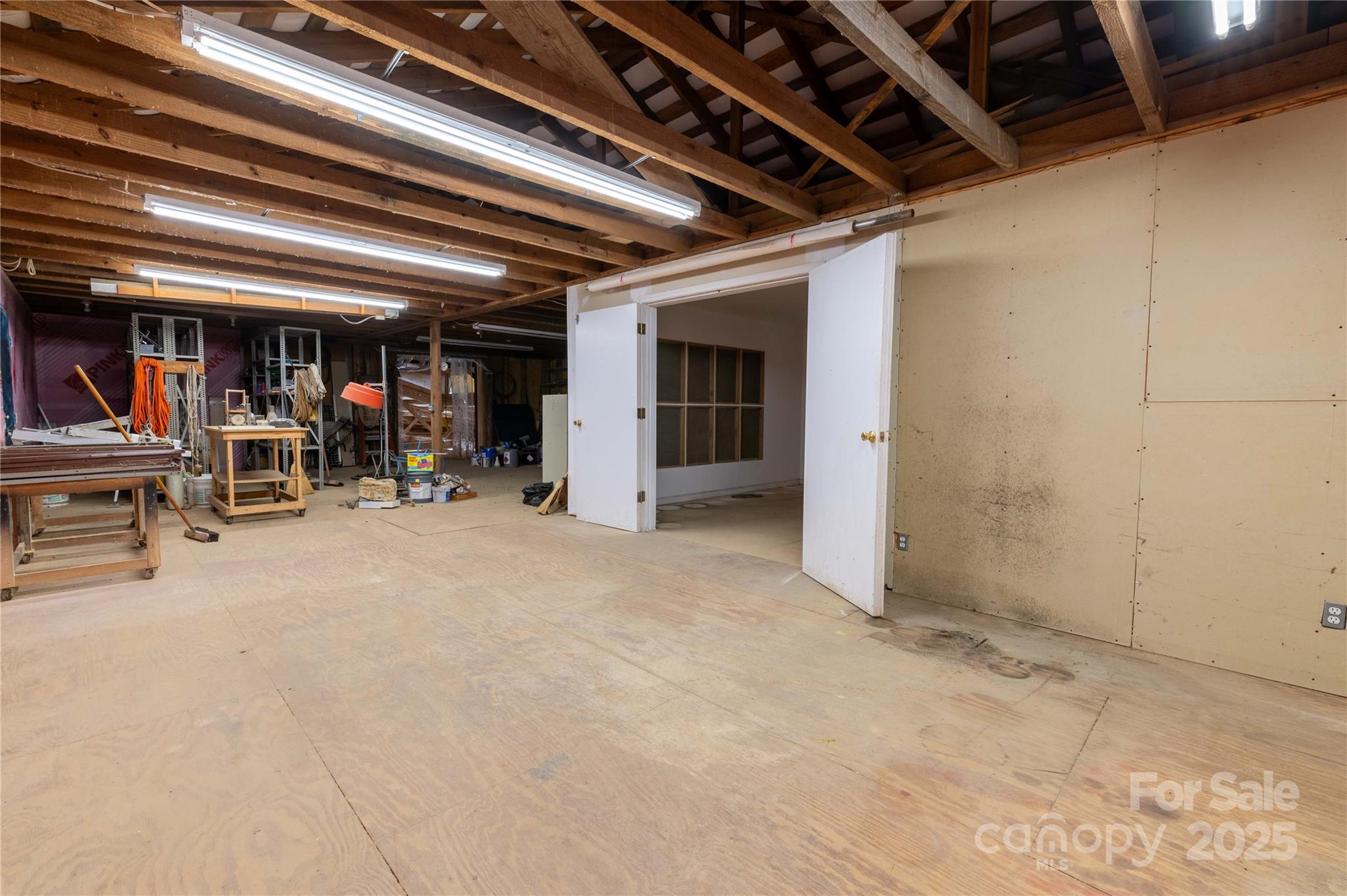 7825 Buck Creek Road Marion, NC 28752 - Photo 45 of 48 a view of a room with gym equipment