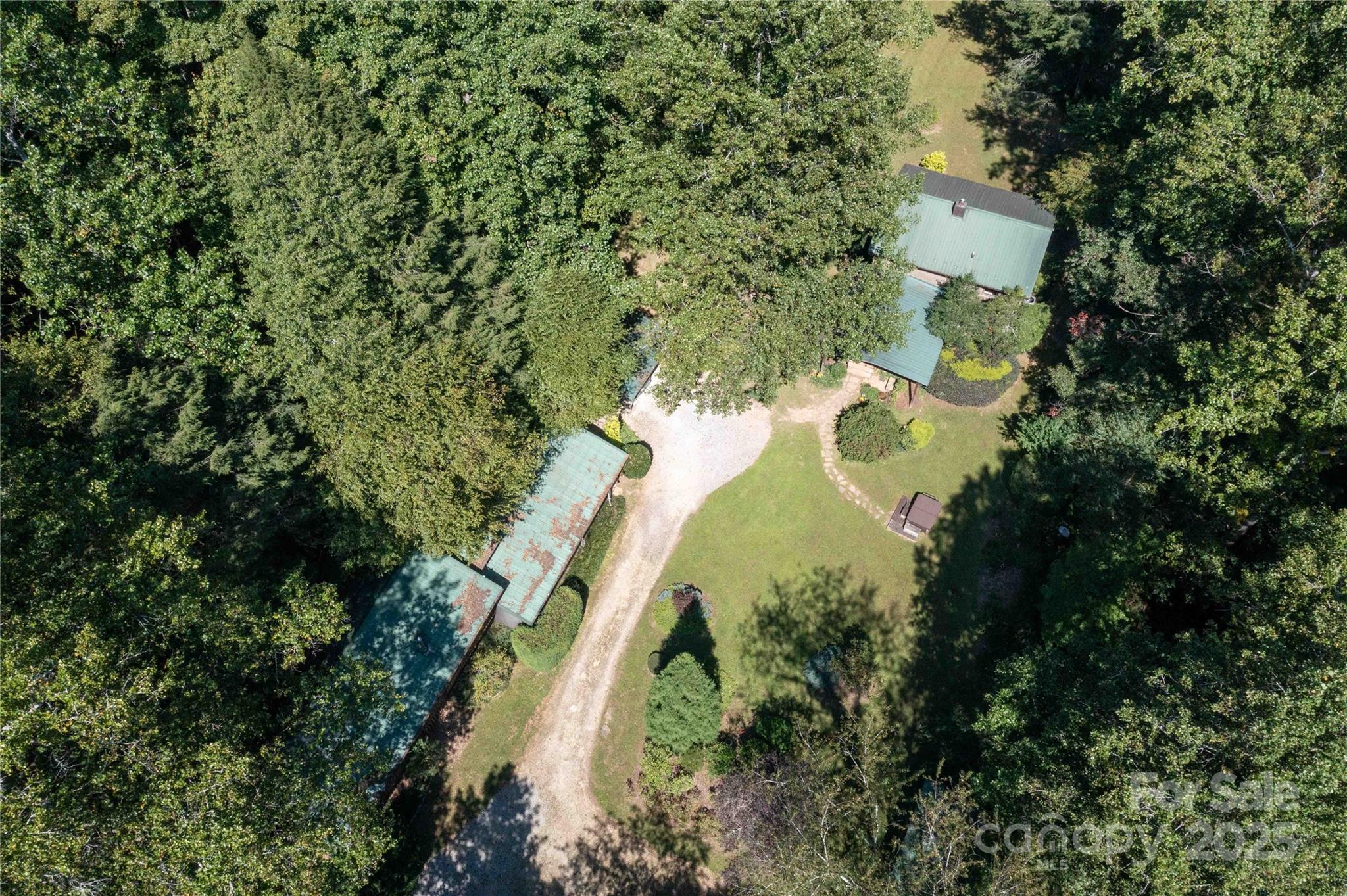 7825 Buck Creek Road Marion, NC 28752 - Photo 6 of 48 a view of a house with a yard