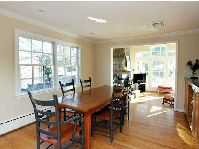 152 Lockwood Road Riverside, CT 06878 - Photo 3 of 12 a view of a dining room with furniture and wooden floor