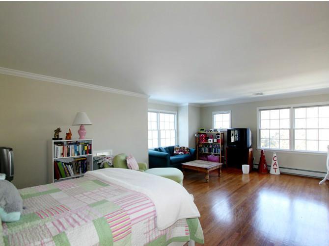 152 Lockwood Road Riverside, CT 06878 - Photo 8 of 12 a bed room with bed and window