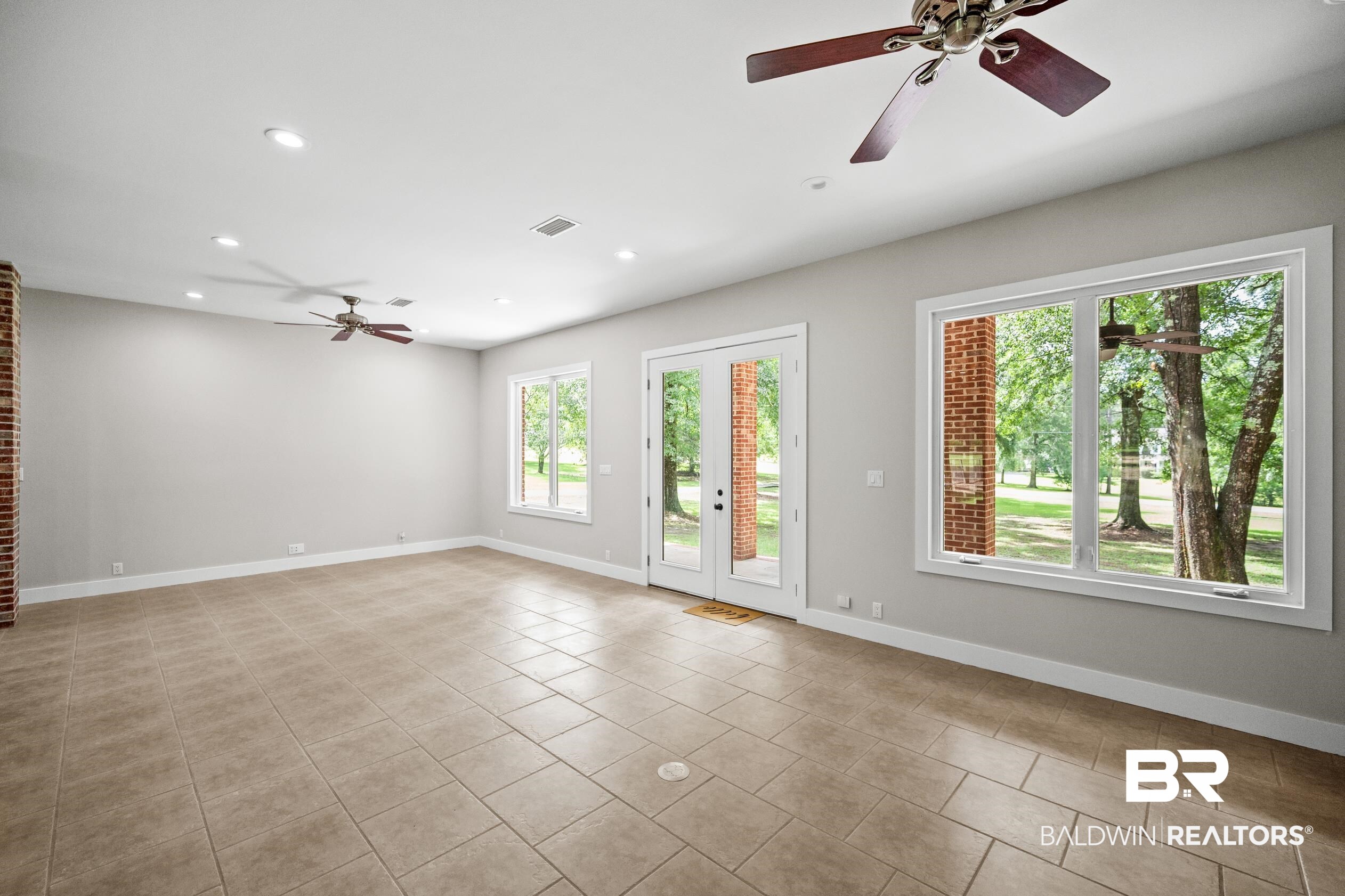 15031 Timber Ridge Drive Loxley, AL 36551 - Photo 25 of 43 Tiled spare room featuring ceiling fan