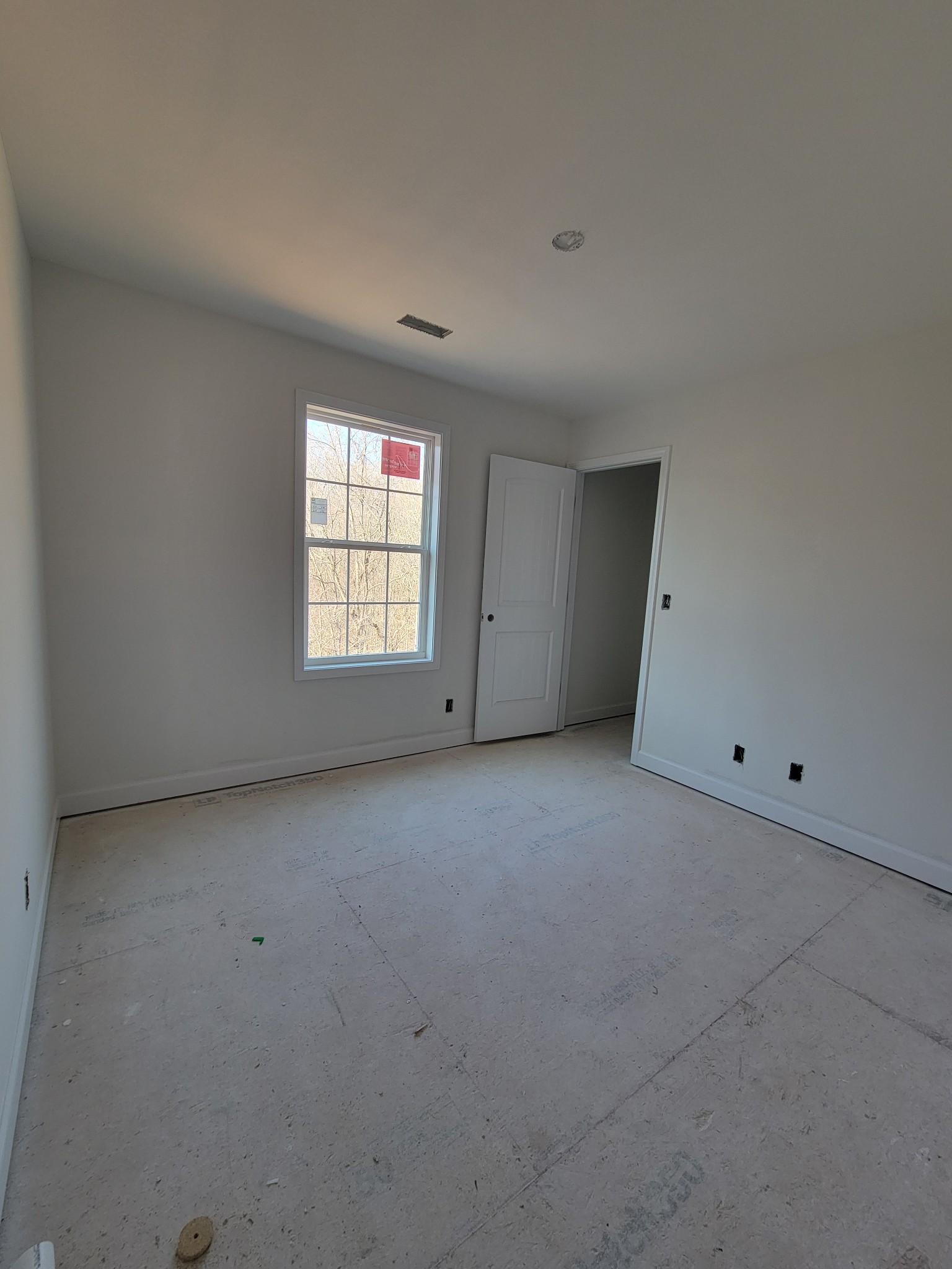 2275 Mockingbird Hill Road Palmyra, TN 37142 - Photo 13 of 18 an empty room with windows