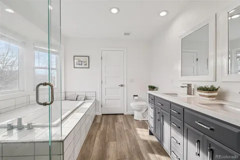 a bathroom with a sink and a shower