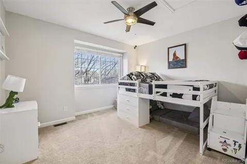 a bathroom with a toilet and a bathtub