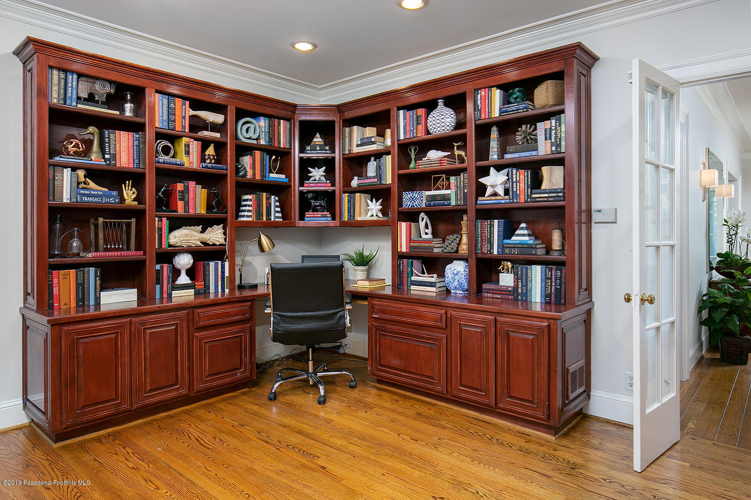 820 Arden Road Pasadena, CA 91106 - Photo 21 of 75 a view of a workspace with bookshelf