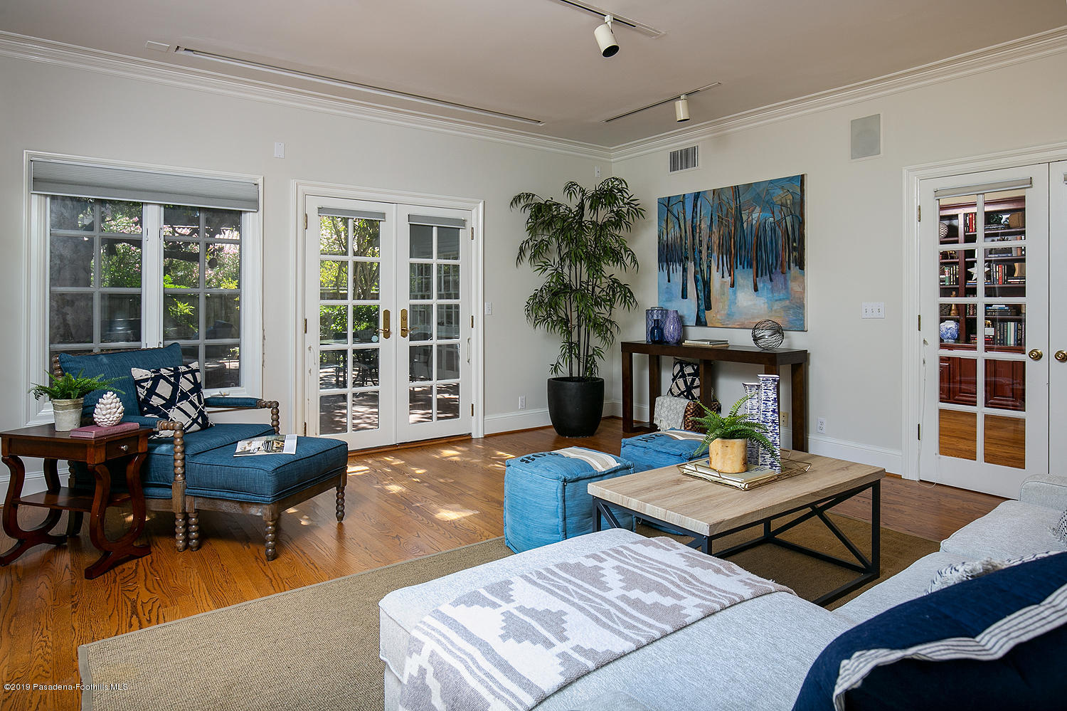 820 Arden Road Pasadena, CA 91106 - Photo 25 of 75 a living room with furniture and a potted plant