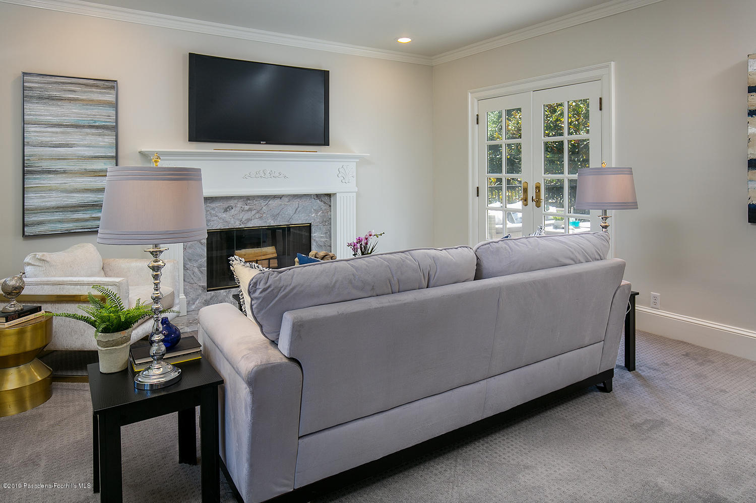 820 Arden Road Pasadena, CA 91106 - Photo 34 of 75 a living room with furniture fireplace and flat screen tv