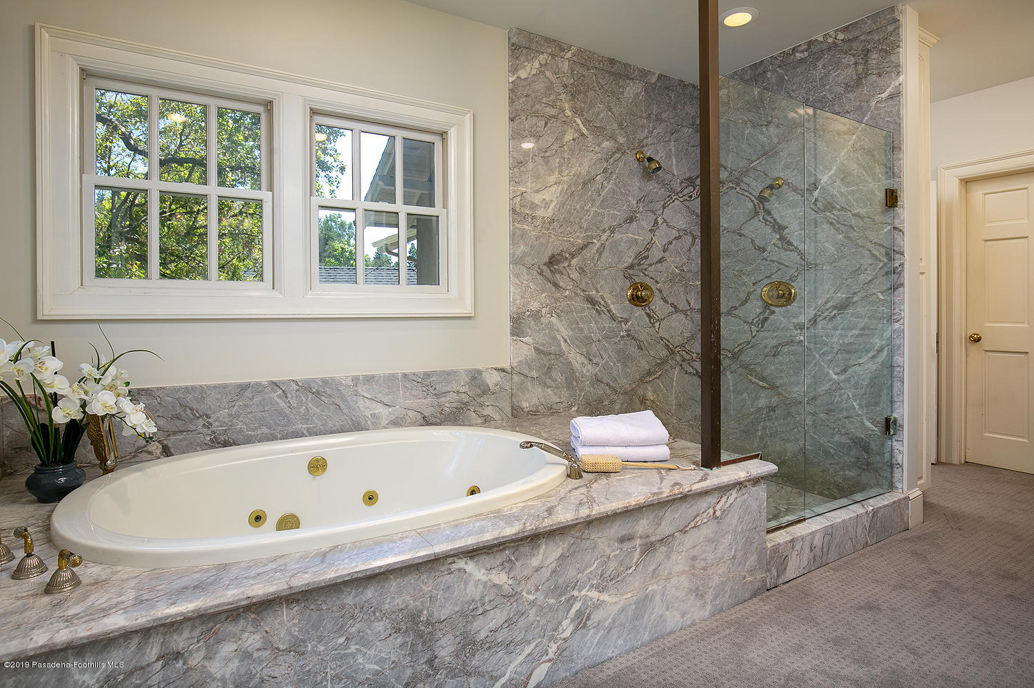 820 Arden Road Pasadena, CA 91106 - Photo 42 of 75 a white bath tub sitting next to a shower