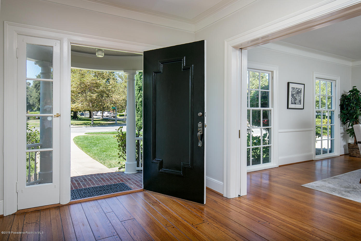 820 Arden Road Pasadena, CA 91106 - Photo 6 of 75 wooden floor in an empty room with a window