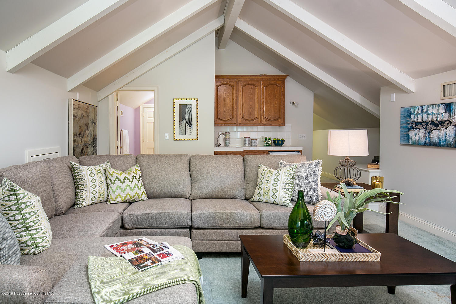 820 Arden Road Pasadena, CA 91106 - Photo 54 of 75 a living room with furniture and a wooden floor