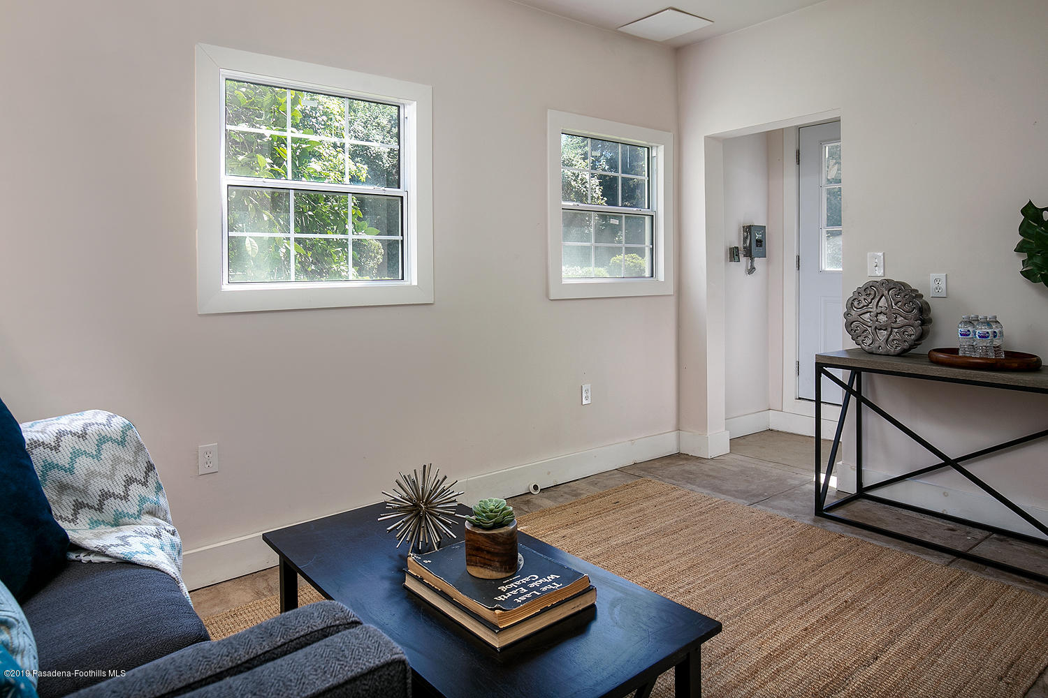 820 Arden Road Pasadena, CA 91106 - Photo 68 of 75 a living room with furniture and a window
