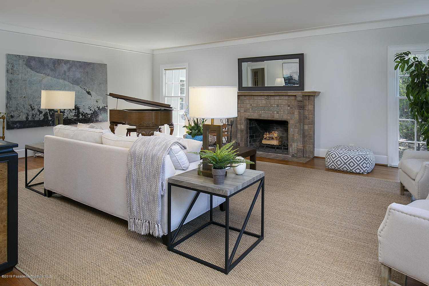 820 Arden Road Pasadena, CA 91106 - Photo 8 of 75 a living room with furniture and a fireplace