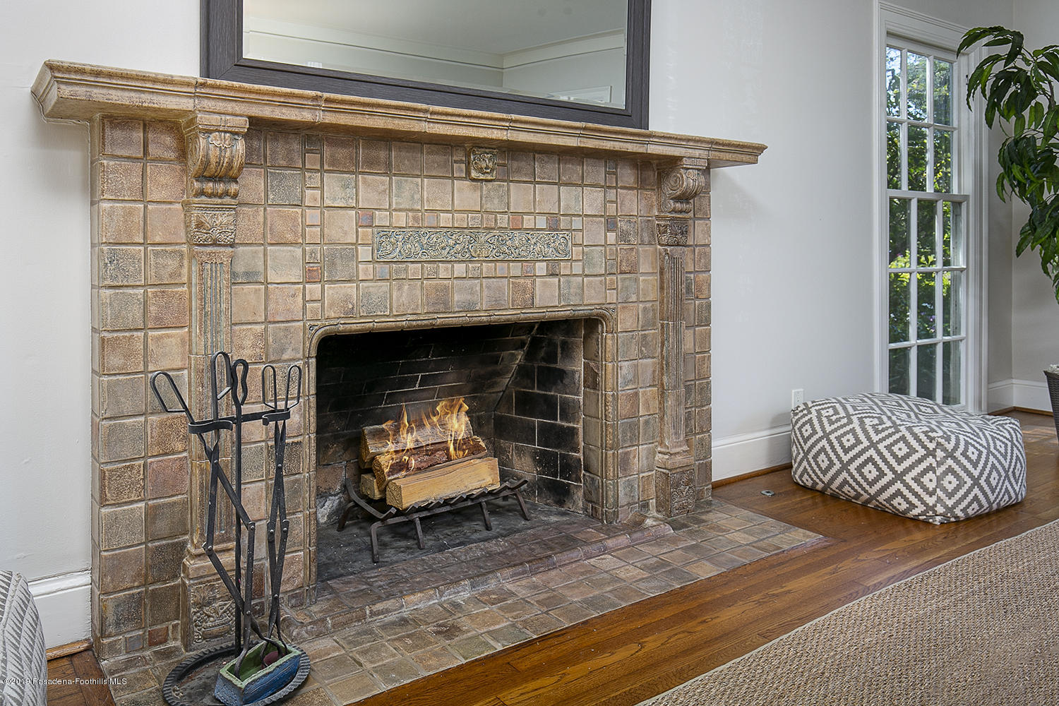 820 Arden Road Pasadena, CA 91106 - Photo 9 of 75 a living room with furniture and a fireplace