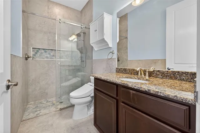 a living room with furniture a rug and a window